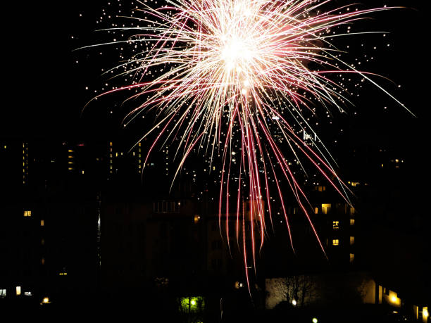 istock new year's fireworks over the city 877474452