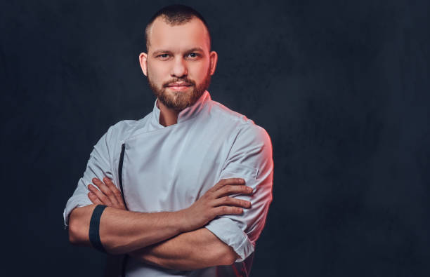 istock Portrait of bearded chef cook. 877481436
