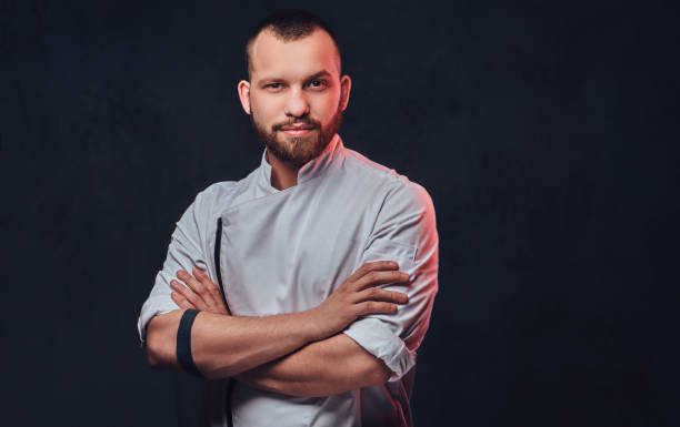 istock Portrait of bearded chef cook. 877483484