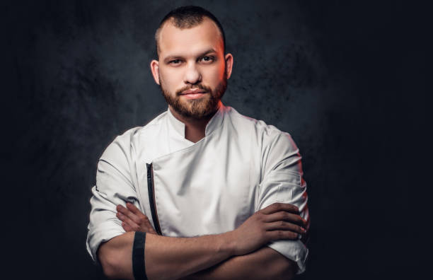 istock Portrait of bearded chef cook. 877485522