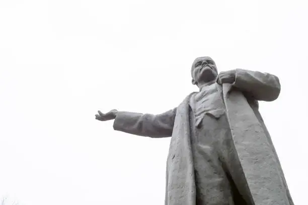 Soviet lenin Russian leader statue with a brilliant white sky