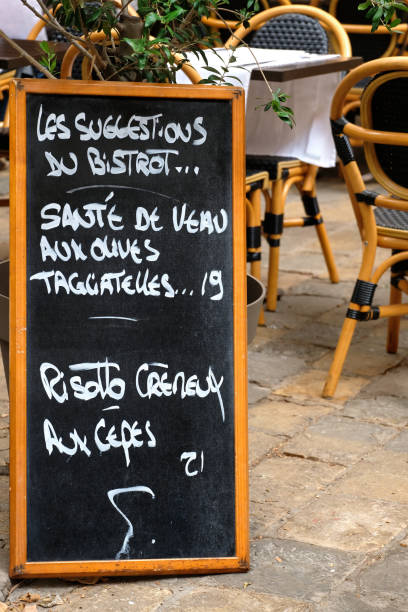 istock Menu board at French restaurant 877494324