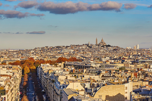 Aerial panoramic cityscape view of Paris, France with Sacre-Coeur Cathedral and Montmartre hill
