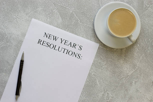 istock New Year's resolutions paper,coffee with foam 877501388