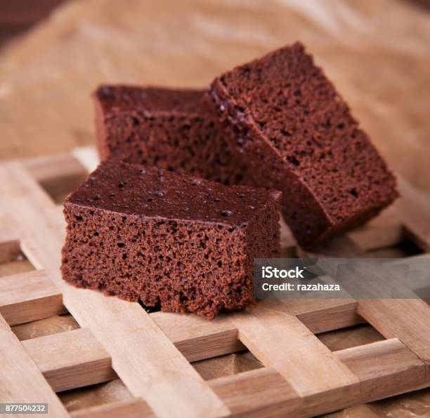 Chocolate Cake Cut Into Slices Stock Photo - Download Image Now - Chocolate Cake, Fruitcake, Baked Pastry Item