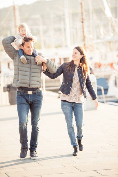 istock Young Family Enjoying Togetherness 877504364