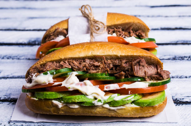 istock Sandwich with meat and vegetables 877504566