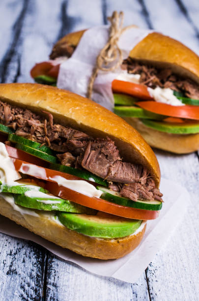 istock Sandwich with meat and vegetables 877504654