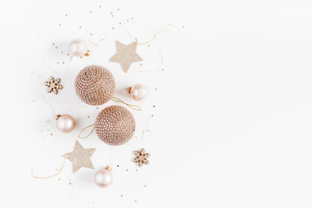 istock Christmas balls, golden decorations. Flat lay, top view 877505368