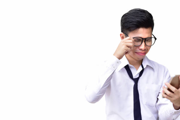 istock Business man wearing eyes glasses crying when using cell phone on isolated white background 877515554