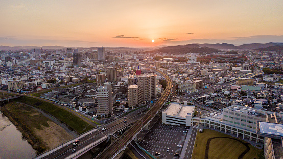 Aerial view of a Japanese city at sunset. Okayama, Japan. November 2017