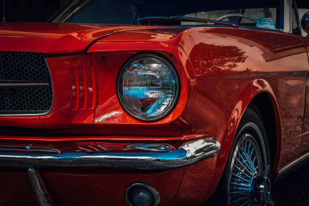 Classic American car from the sixties in bright red color