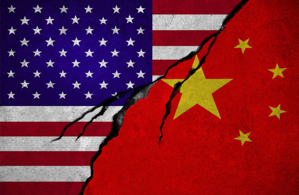 istock USA and Chinese flag, conflict concept 877586802
