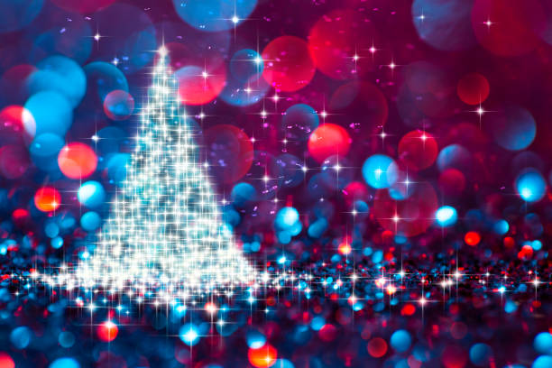istock Shiny Christmas tree in glitter defocused background - Bokeh Blue Red 877597172