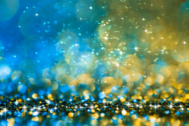 istock Christmas lights defocused background - Bokeh Gold Blue 877694886