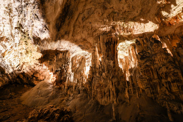 istock Postojna Cave (Slovenian: Postojnska jama; Italian: Grotte di Postumia) is a 20,570 m long Karst cave system 877694998