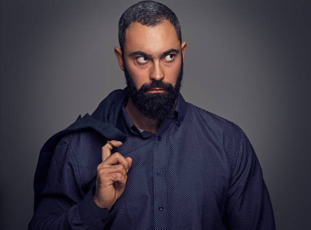istock Serious, bearded male dressed in a suit. 877718106