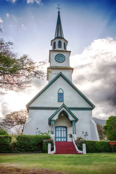 small wooden church with blue sky on Hawaii