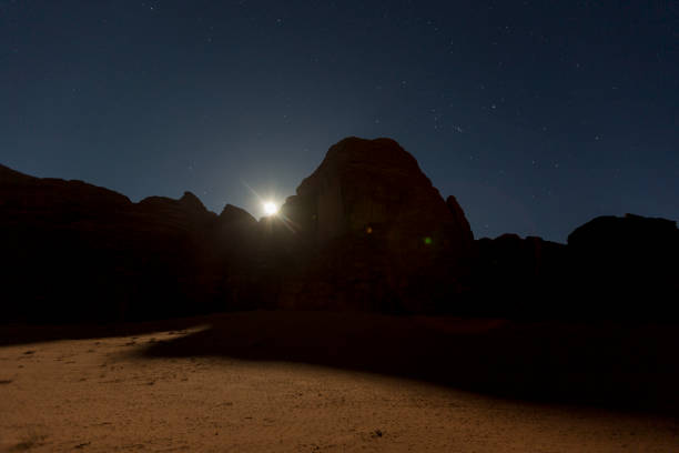 istock Wadi Rum at night during full moon, Jordan 877737644