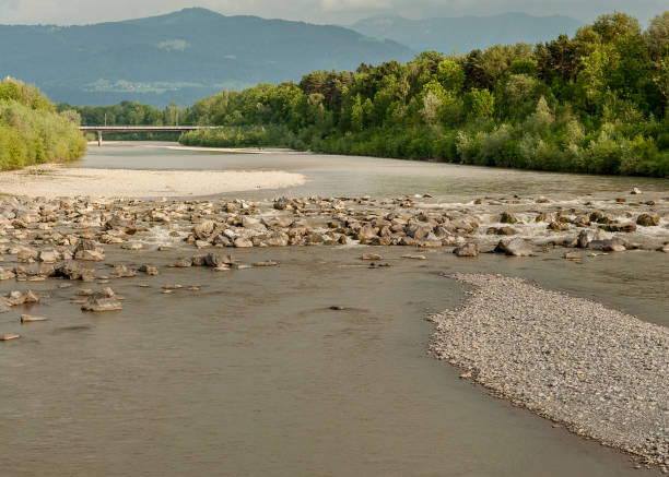 River Bregenzer Ache with mountains in the background in summer, Austria