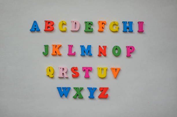 istock Multicolored letters of the alphabet on a white background 877749030