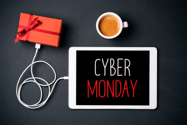 gift and text happy cyber monday in a tablet - 5600 imagens e fotografias de stock