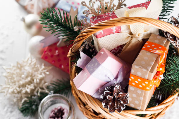 istock Christmas Gifts on Wooden Background. 877763536