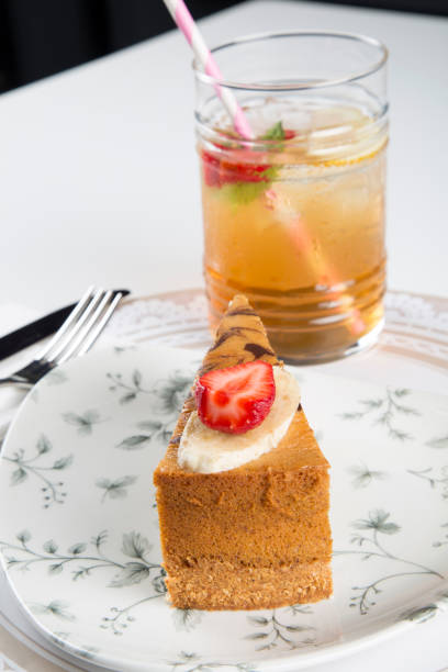istock very delicious carrot cake with chololate and vanilla and strawberry and ice tea 877767158