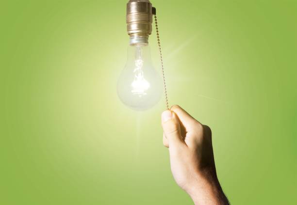 switch. - alternative energy data fuel and power generation light bulb - fotografias e filmes do acervo