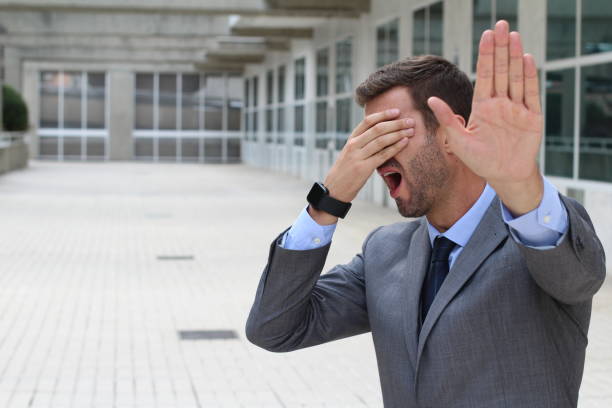 istock Business covering his eyes to avoid reality 877777022