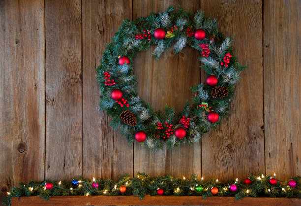 istock Christmas Winter Wreath Over Mantle 877780576