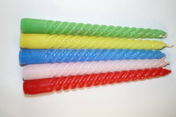 istock colored candles for the New Year holiday 877808130