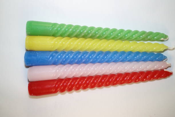 istock colored candles for the New Year holiday 877808378