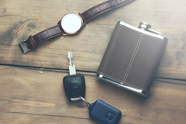 istock pocket bottle, key and watch 877811632