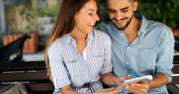 istock Happy couple doing shopping on internet 877813944