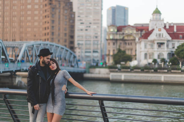 istock Happy couple by the river 877822604