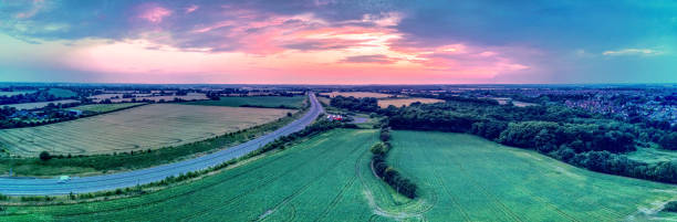 Aerial panoramic Essex motorway Flying over the A120 in Essex near Braintree and Chelmsford.  Taken with DJI MavicPro drone braintree essex photos stock pictures, royalty-free photos & images