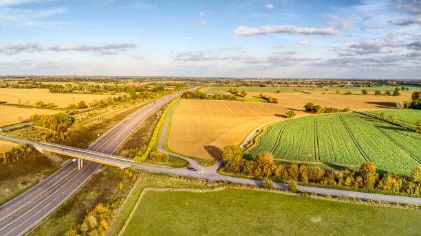 Aerial panoramic Essex motorway Flying over the A120 in Essex near Braintree and Chelmsford.  Taken with DJI MavicPro drone braintree essex photos stock pictures, royalty-free photos & images