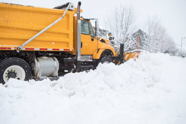 istock Snow Plow Plowing Street After Snow Storm 877830472