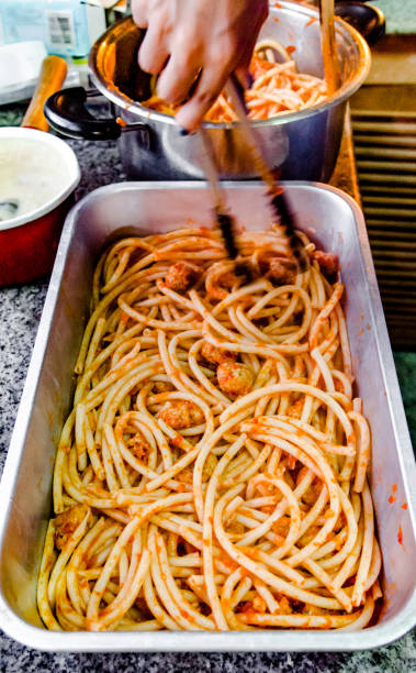 istock Pasta and meat ball with tomato sauce in tray 877842578
