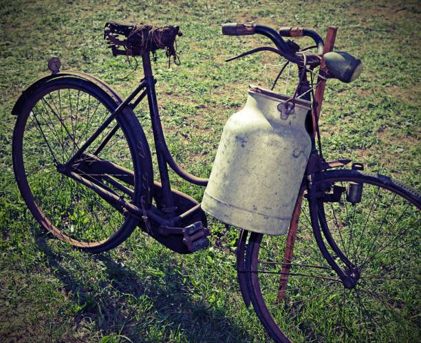istock ancient milking bike with milk bin and vintage effect 877849664