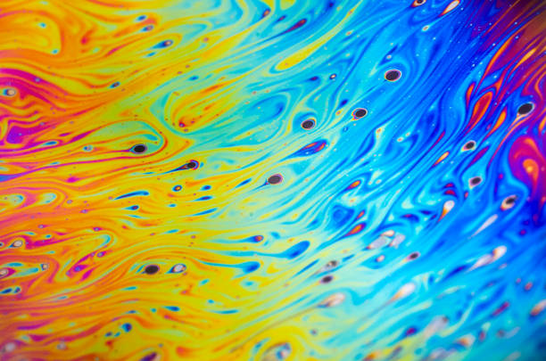 istock Beautiful psychedelic abstraction formed by light on the surface of a soap bubble 877850978
