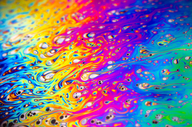 istock Beautiful psychedelic abstraction formed by light on the surface of a soap bubble 877853278