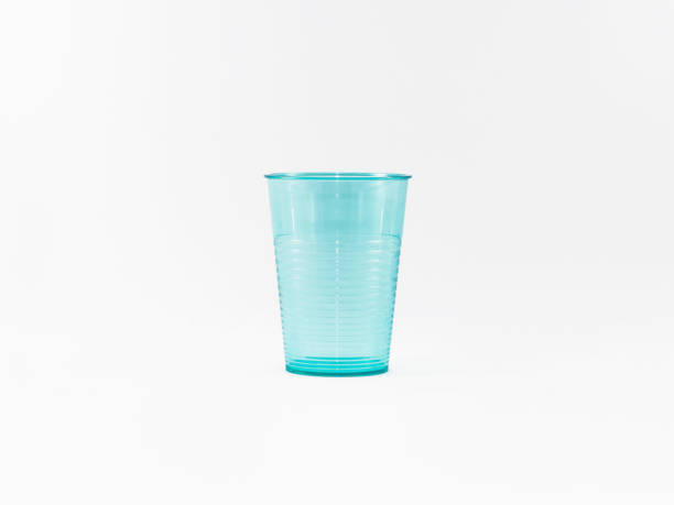 istock Blue plastic glass isolated on white background 877861530