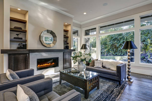 istock Chic living room filled with built-in fireplace 877876592