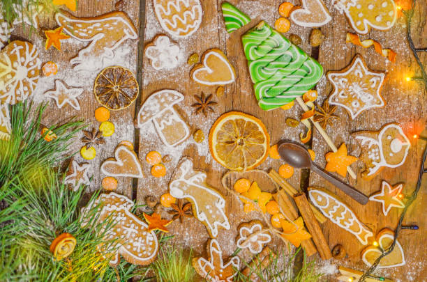 istock Christmas composition on vintage wooden background 877877384