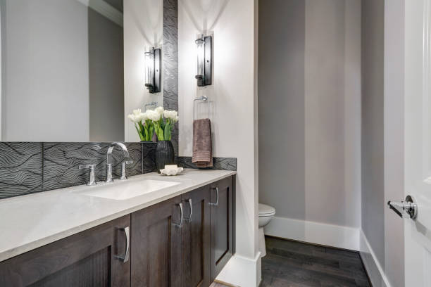 istock White and brown bathroom boasts a nook filled with taupe vanity 877878008