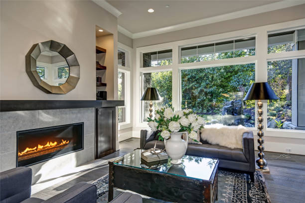 istock Chic living room filled with built-in fireplace 877880424