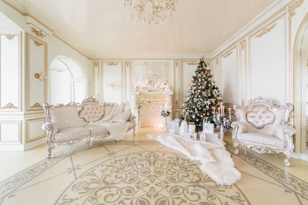 istock Christmas morning. luxury classic apartments with a white fireplace. 877890422