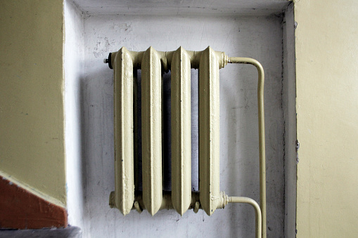 radiator in the wall. Old wall radiator. photo taken in Lithuania